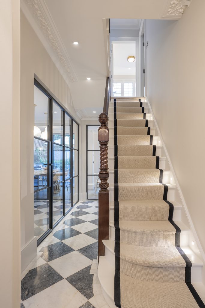 Entrance hall and staircase at Muswell Haven