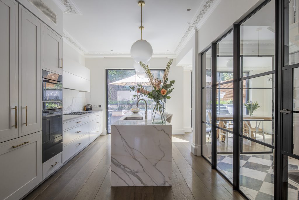 Kitchen with glazed screen at Muswell Haven