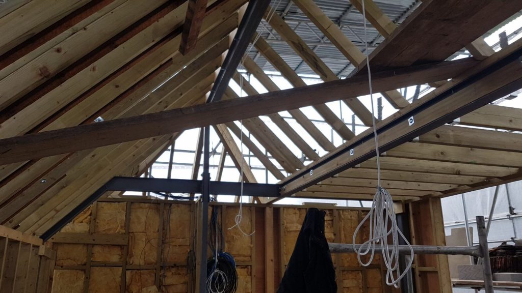 New timber roof framing and structural steel during the East Finchley loft conversion