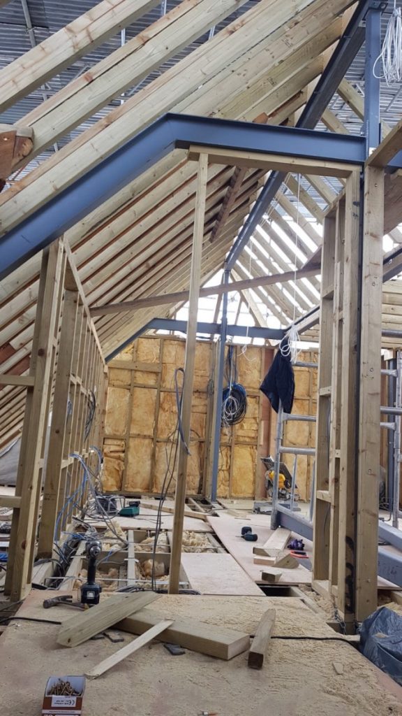 Structural steelwork and timber roof framing during East Finchley loft conversion